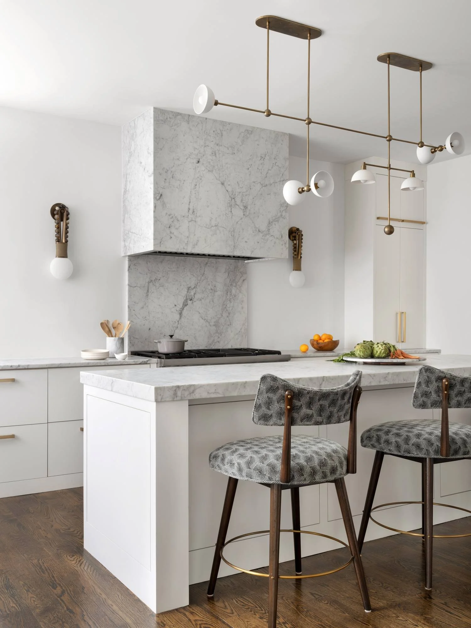 Peachtree-Battle-kitchen-marble-range-hood-island-patterned-barstools.jpg