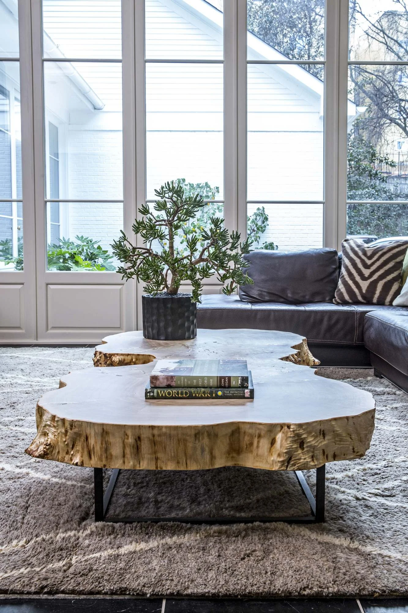 ansley-atlanta-residential-interior-design-living-room-live-edge-coffee-table-leather-sofa.jpg