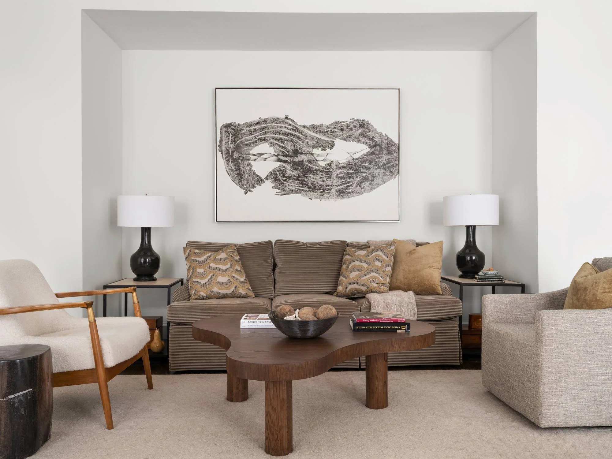 Peachtree-Battle-living-room-brown-sofa-organic-coffee-table-aerial-art.jpg