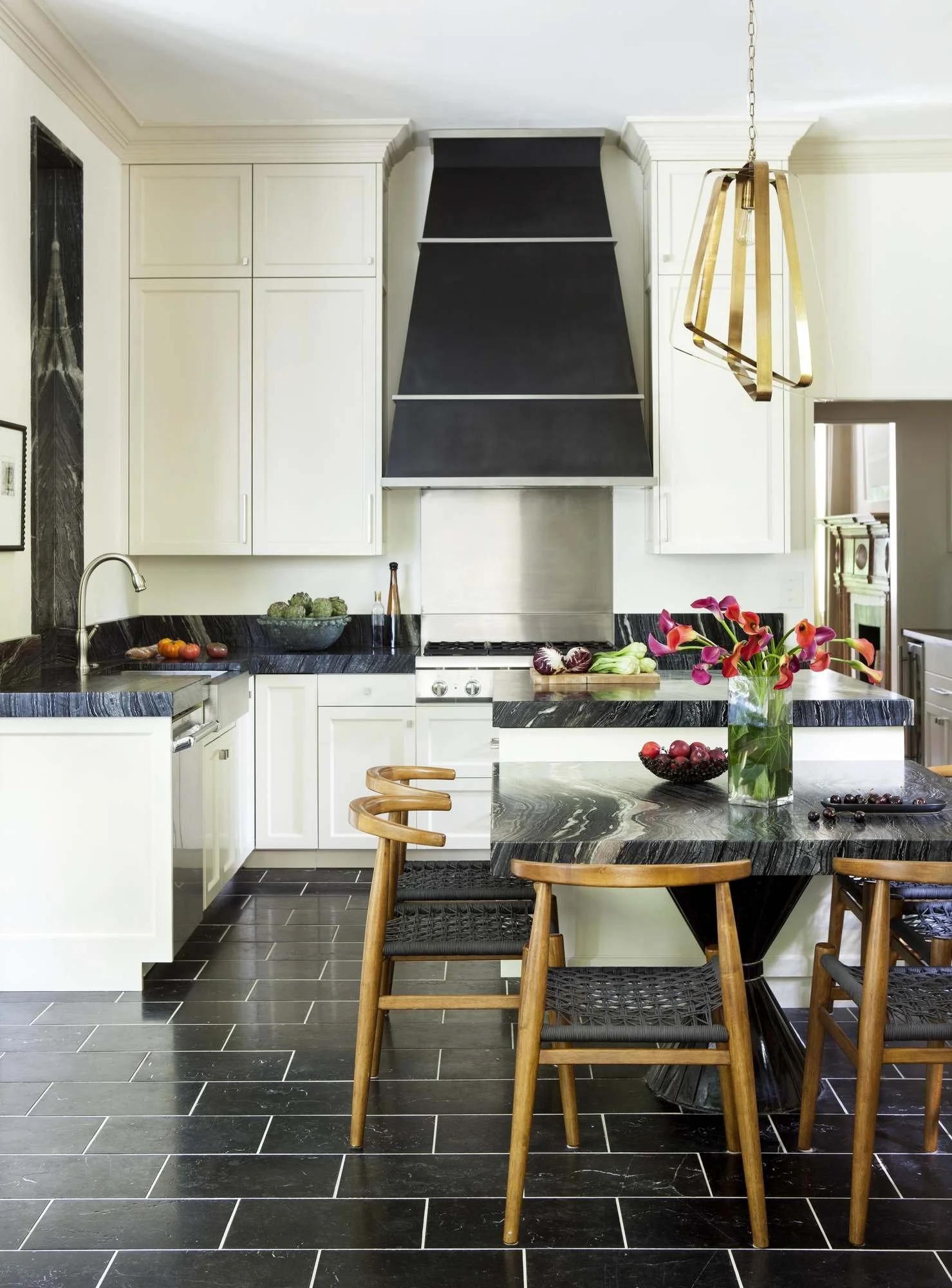 ansley-atlanta-residential-interior-design-kitchen-white-cabinets-black-marble-island.jpg