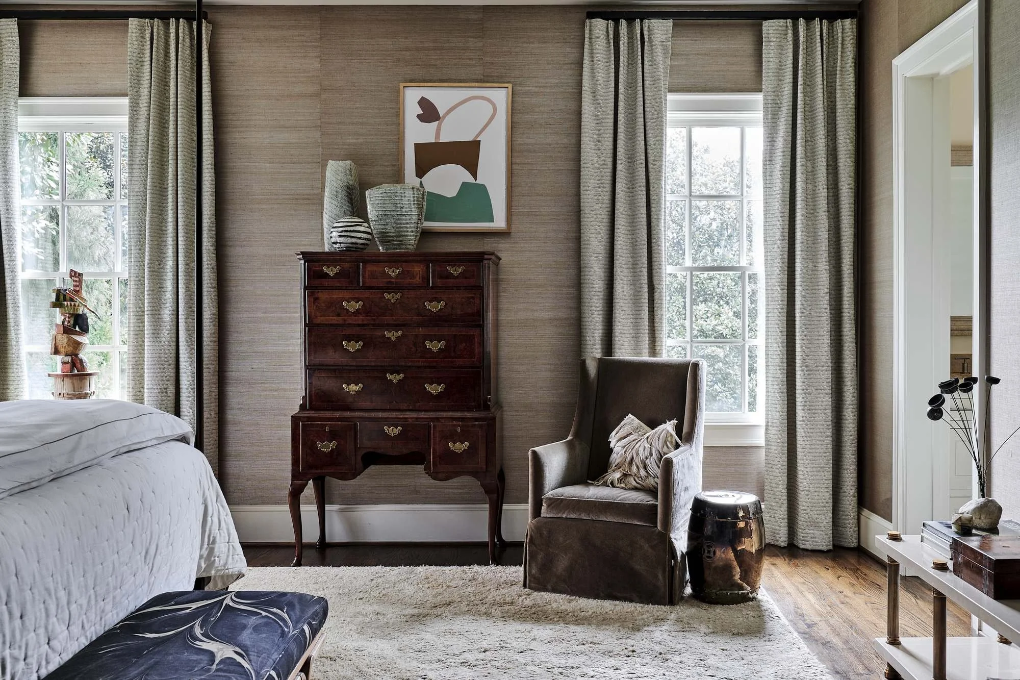atlanta-luxury-primary-bedroom-antique-highboy-wingback-chair.jpg