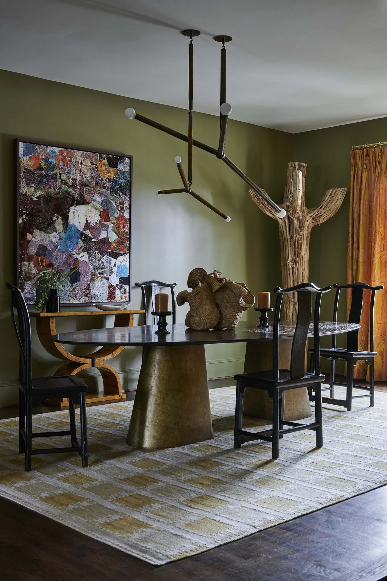 atlanta-luxury-dining-room-olive-walls-sculptural-brass-table.jpg