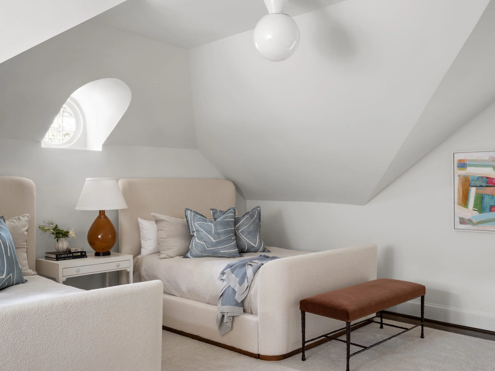 Peachtree-Battle-bonus-room-twin-beds-vaulted-ceiling-oval-window.jpg