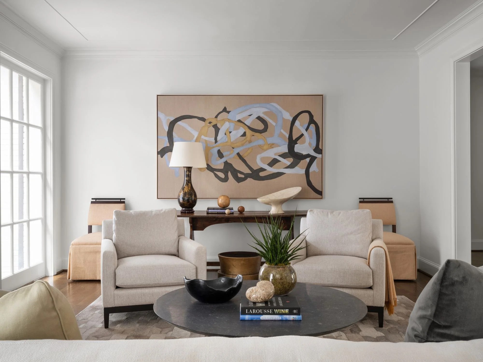 Peachtree-Battle-living-room-linen-club-chairs-abstract-art-console.jpg
