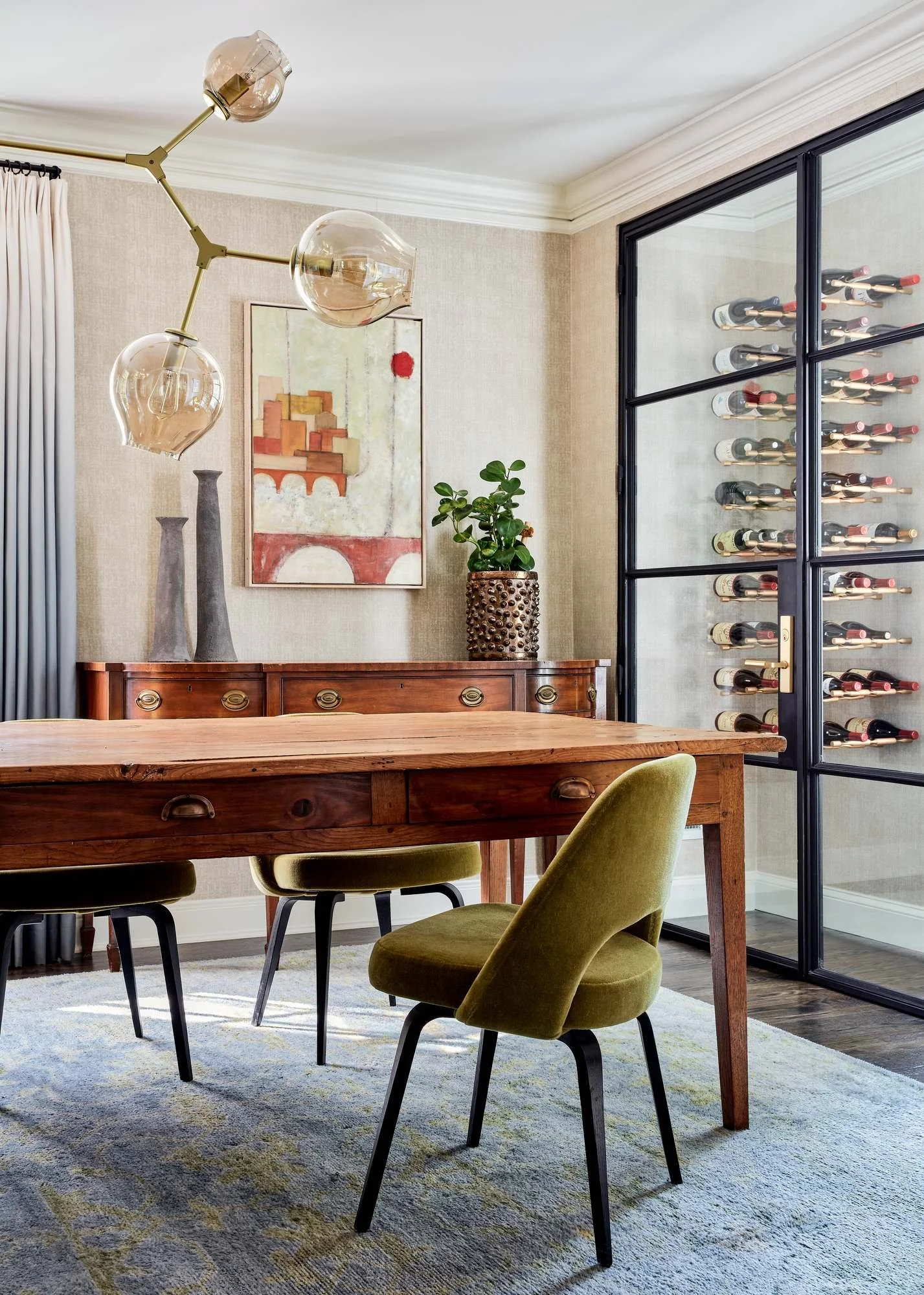 Woodward-Way-dining-room-farm-table-velvet-chairs-abstract-art.jpg