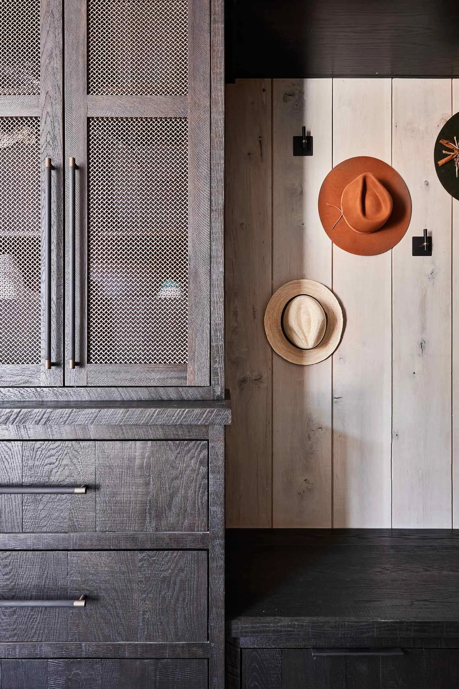 Greenapple-residential-design-hats-hanging-on-the-wall.jpg