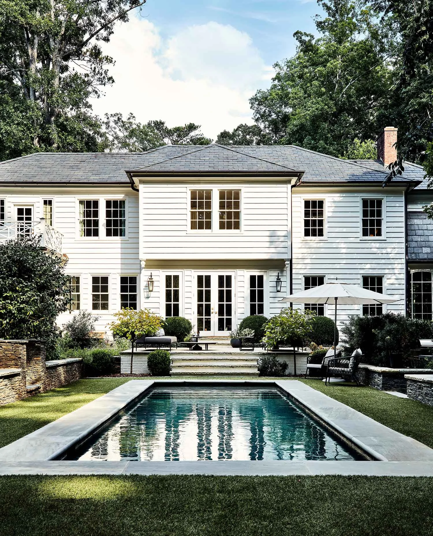exterior-guest-house-atlanta-residential-interior-design-pool-rear-facade-french-doors.jpg