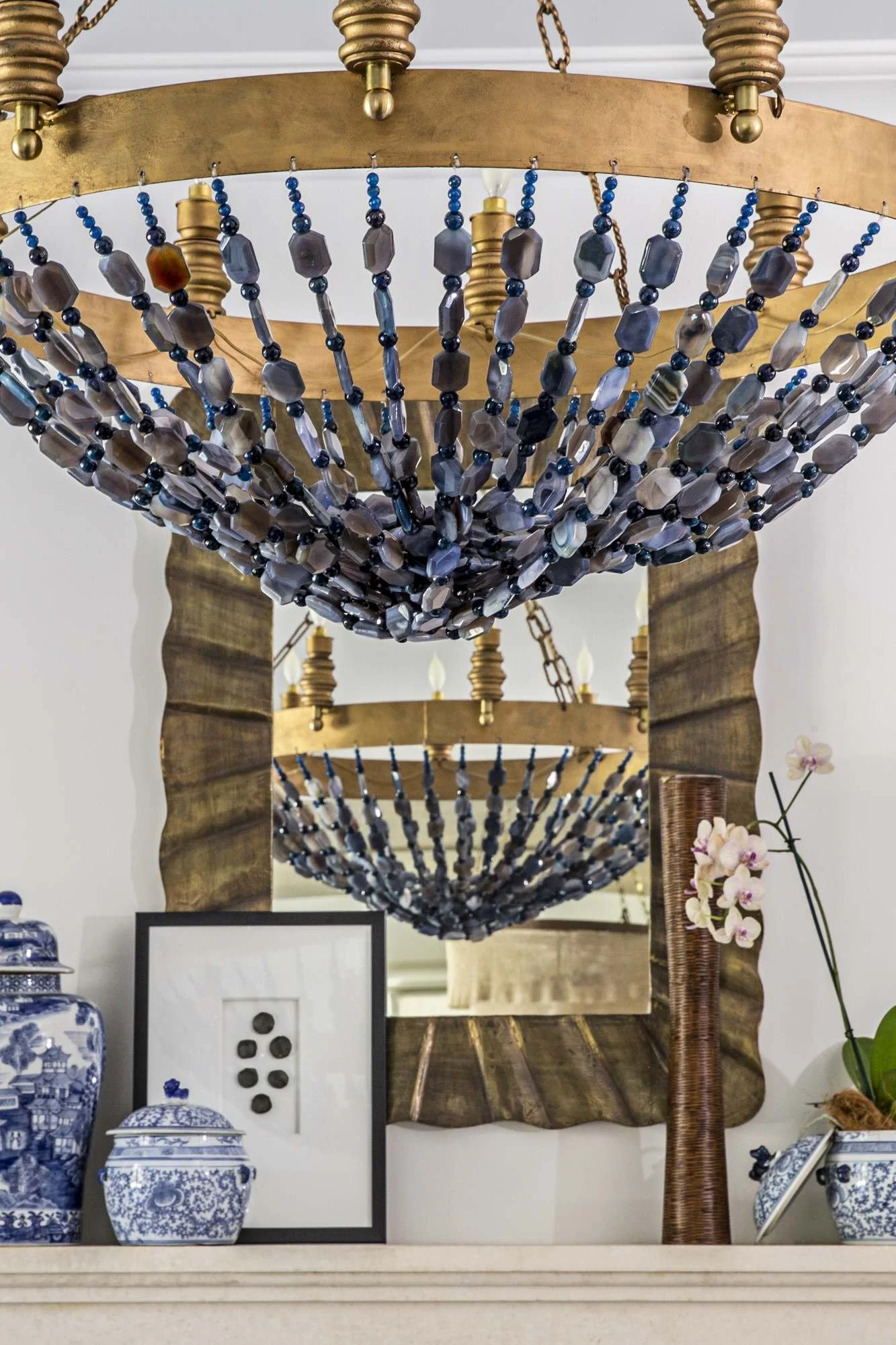 brass-beaded-chandelier-detail-blue-white-mantel-vignette.jpg