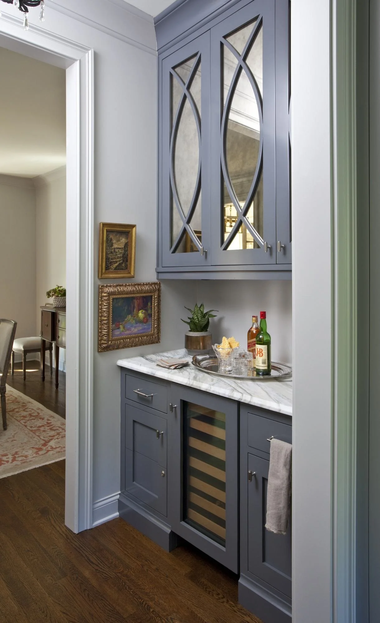 hanover-atlanta-residential-interior-design-butler-pantry-blue-cabinets-mirrored-doors-wine-fridge.jpg