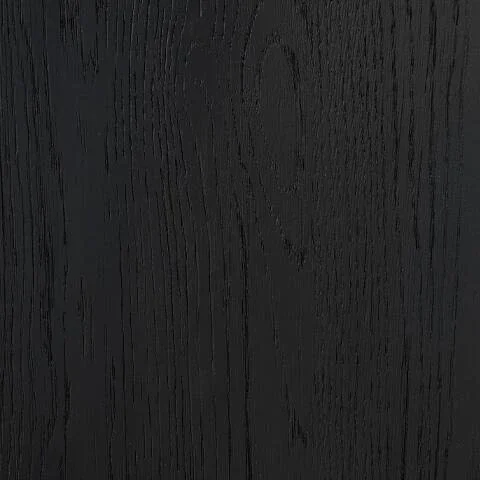 Close-up of the Riverside dining set showcasing the textured wood grain, black finish, neutral upholstery, and premium craftsmanship.