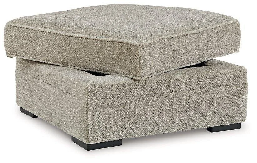 Matching upholstered storage ottoman with hidden storage, removable lid, and built-in cup holders.