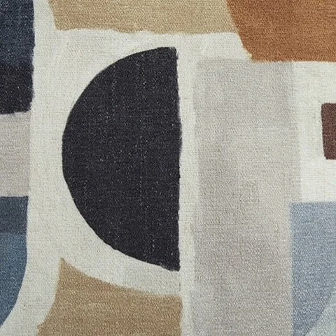 Close-up of the Everett sofa collection showcasing the soft polyester fabric, abstract-pattern accent pillows, and quality craftsmanship.