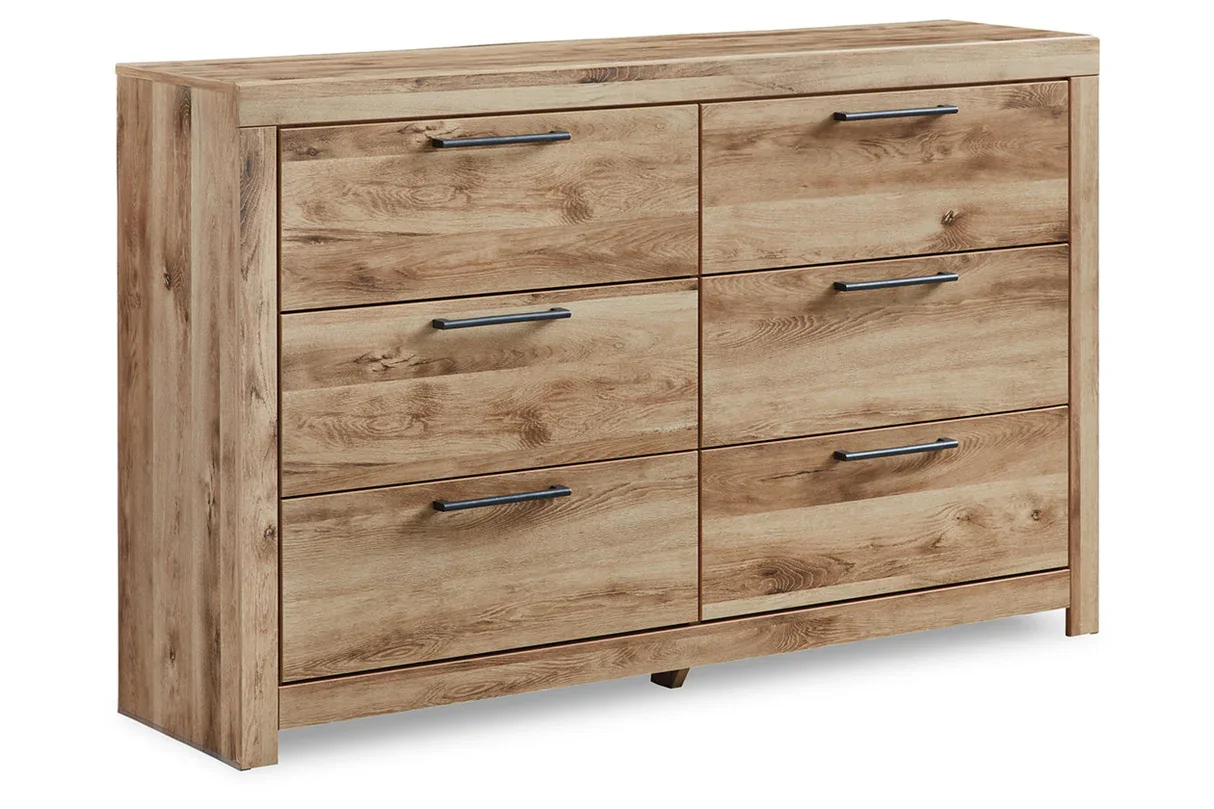 Six-drawer dresser with a matching mirror, golden rustic finish, faux linen-lined drawers, and antiqued gunmetal hardware.