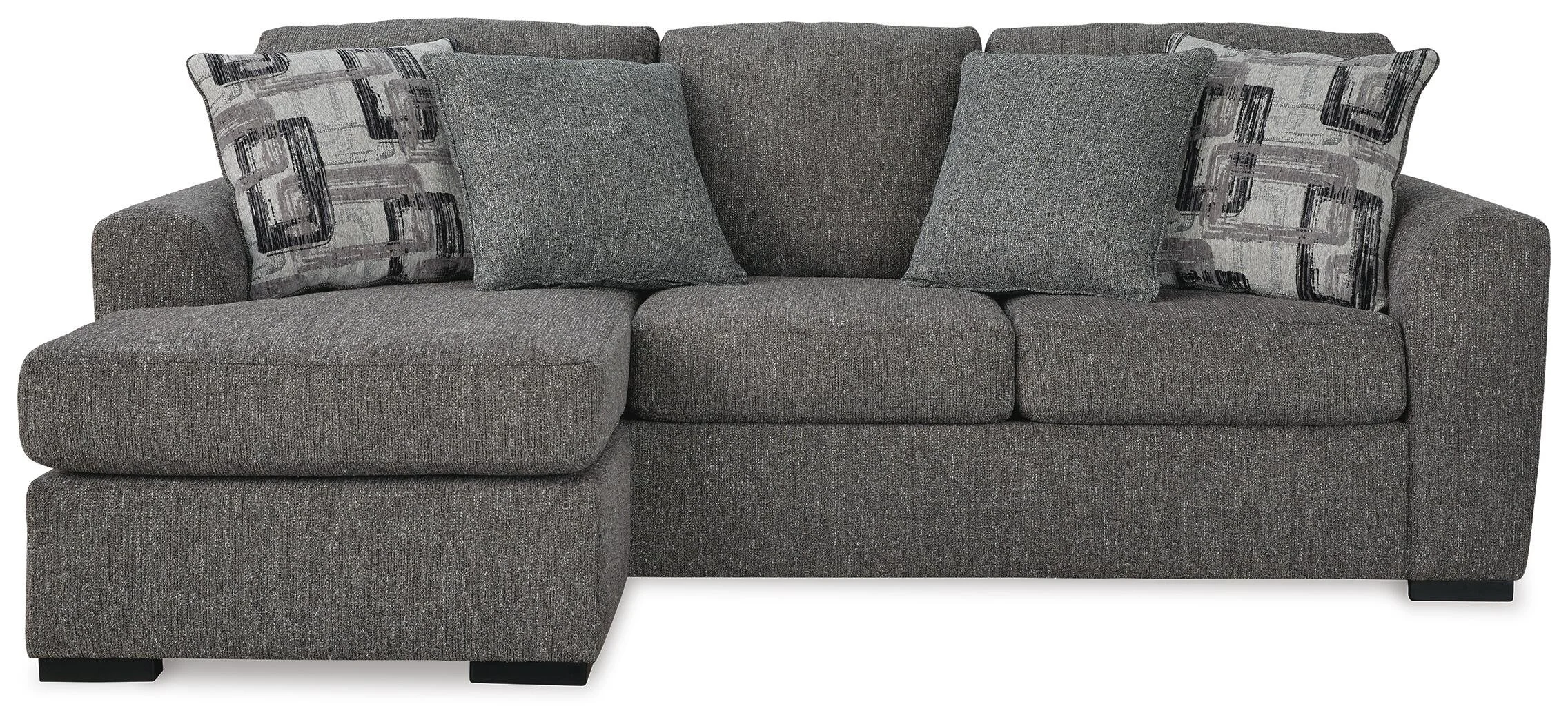 Contemporary reversible sofa chaise with soft polyester upholstery, movable ottoman, plush cushions, and oversized seating.