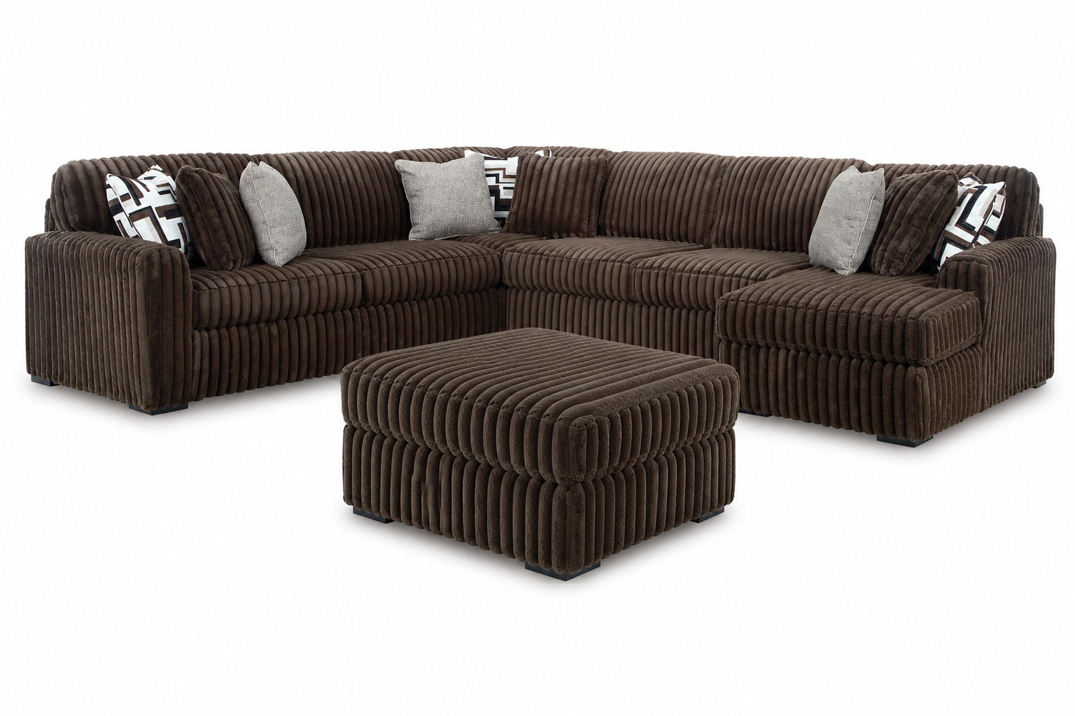 Monarch 4-piece sectional collection with a spacious sectional and matching oversized ottoman on a white background.