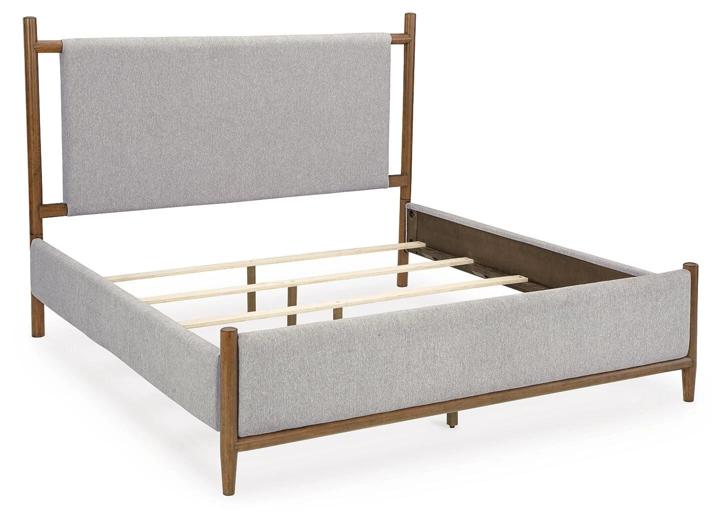 Mid-century upholstered panel bed with a warm medium brown wood finish, soft fabric upholstery, and tapered wood legs.