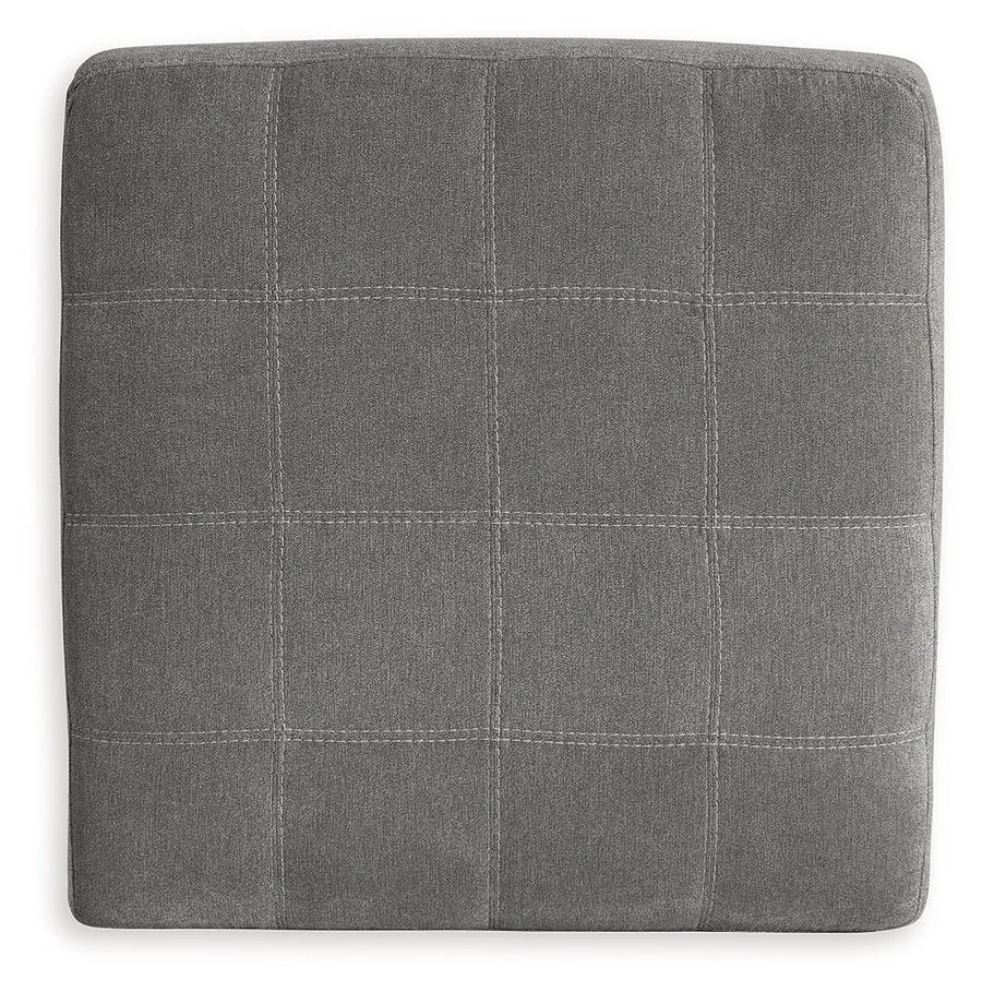 Matching oversized accent ottoman with soft gray polyester upholstery, plush cushioning, and a contemporary design.