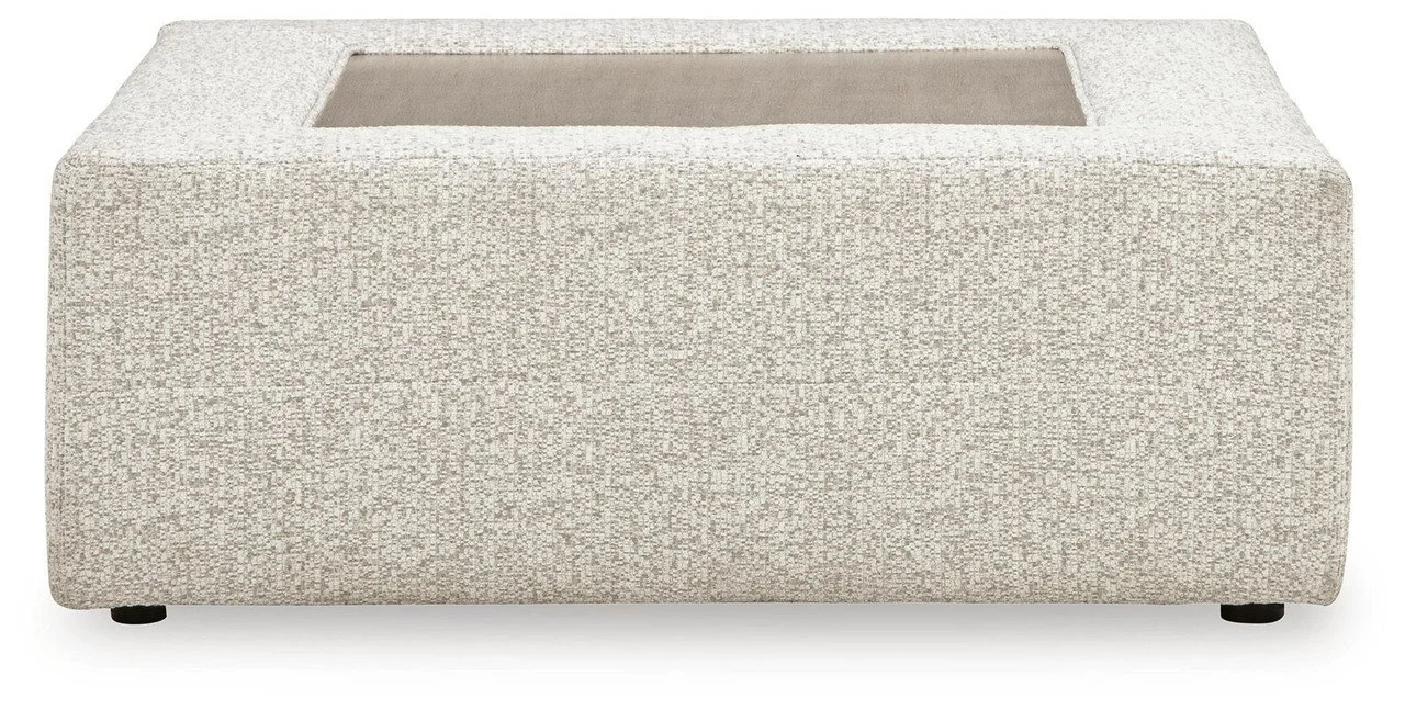 Matching oversized boucle ottoman with plush cushioning and a removable faux wood-look tray table.