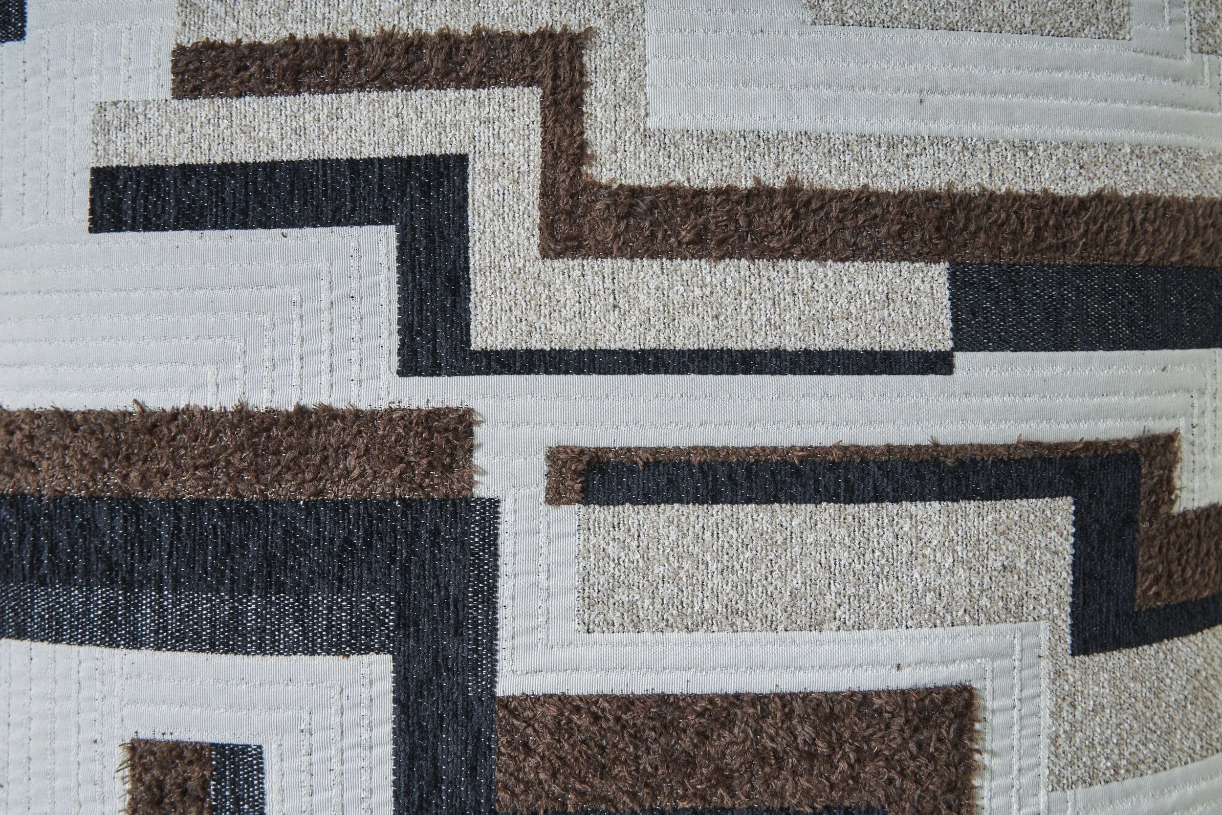 Close-up of the Monarch sectional showcasing the jumbo corduroy fabric, plush cushions, accent pillows, and quality craftsmanship.