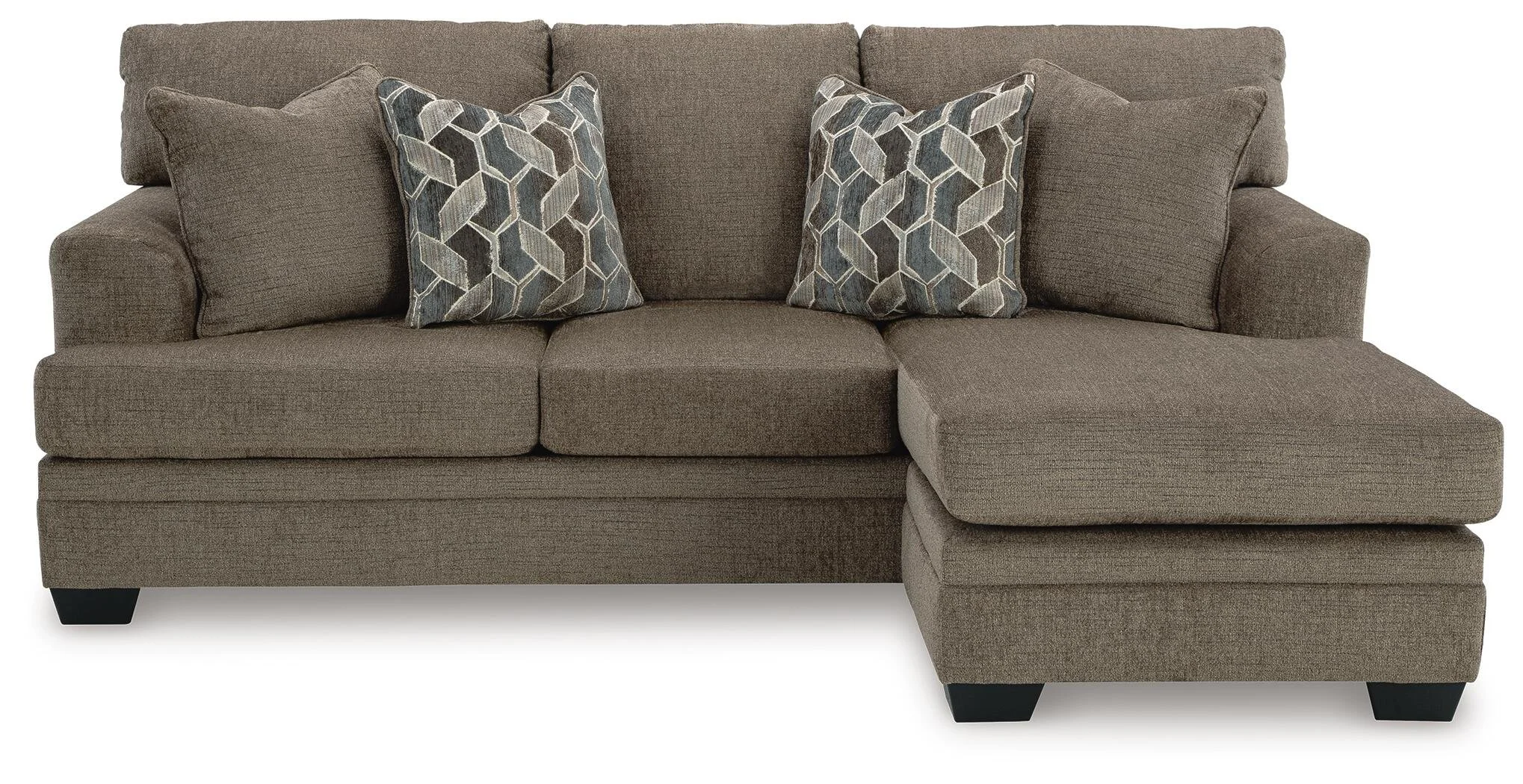 Modern reversible sofa chaise with soft polyester upholstery, movable ottoman, plush cushions, and a contemporary silhouette.