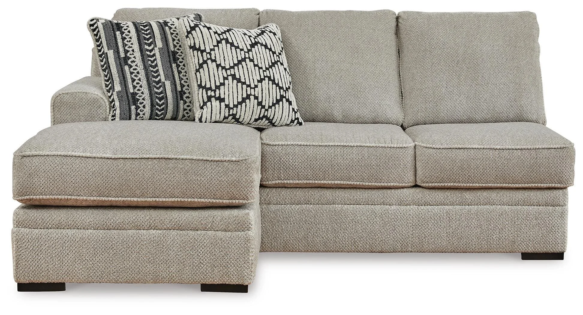 Contemporary dual-chaise sectional with soft polyester upholstery, reversible cushions, plush seating, and coordinating accent pillows.