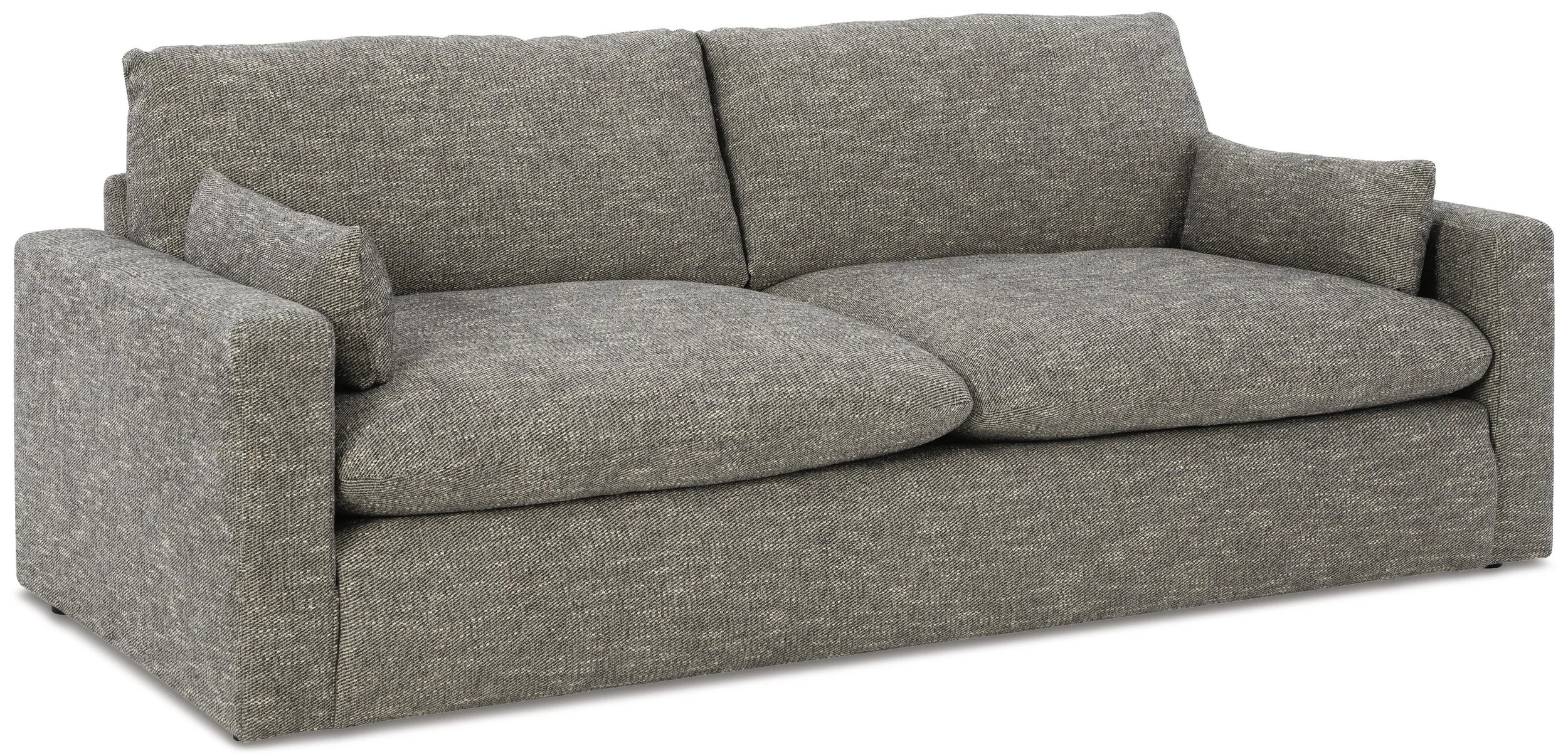 Contemporary sofa with deep feather-fiber blend cushions, granite-colored upholstery, reversible cushions, and bolster pillows.