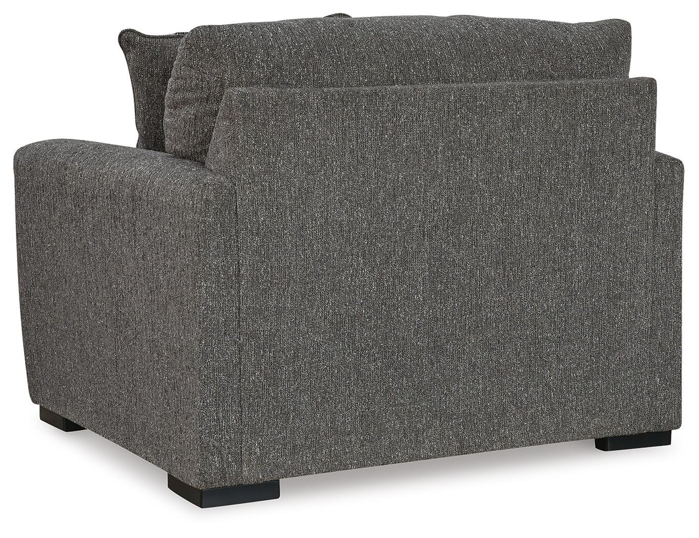 Contemporary oversized upholstered chair with soft polyester fabric, reversible seat cushion, plush accent pillows, and supportive foam cushioning.