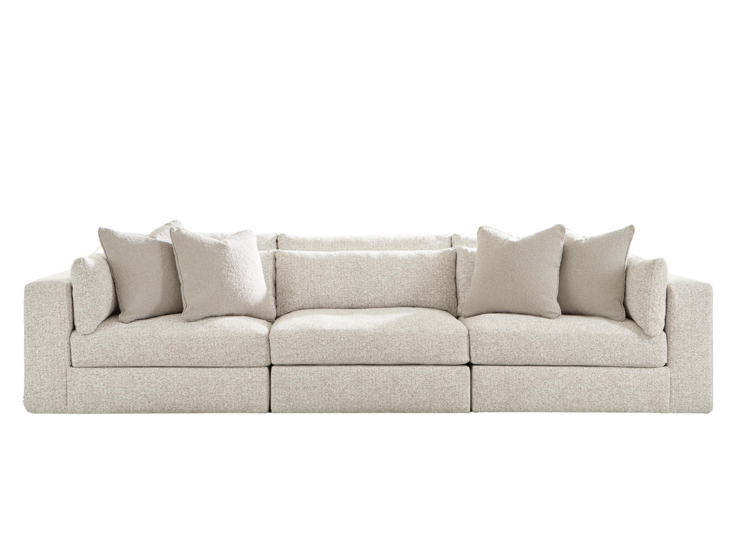 Contemporary modular sectional with plush boucle upholstery, reversible cushions, feather-fiber comfort, and flexible seating configuration.