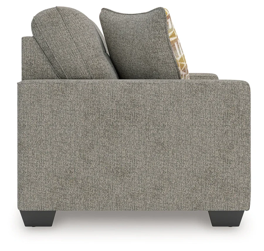 Matching transitional loveseat with track arms, soft polyester upholstery, plush cushions, and coordinating accent pillows.