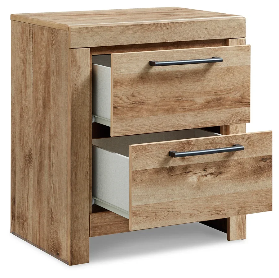 Two-drawer nightstand with a golden rustic finish, faux linen-lined drawers, antiqued gunmetal hardware, and built-in USB charging ports.