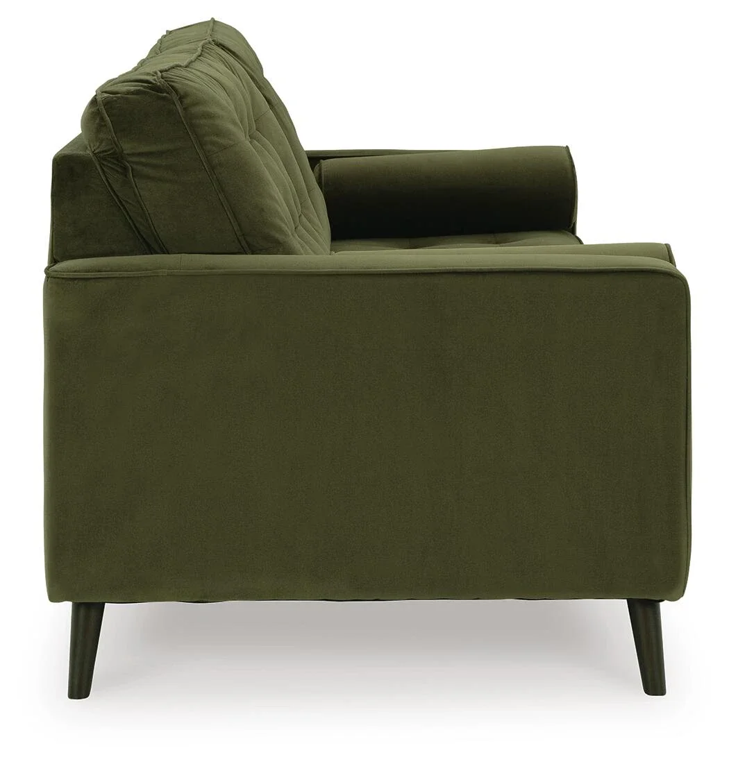 Contemporary velvet sofa with button-tufted back cushions, tapered splay legs, plush seating, and coordinating bolster pillows.