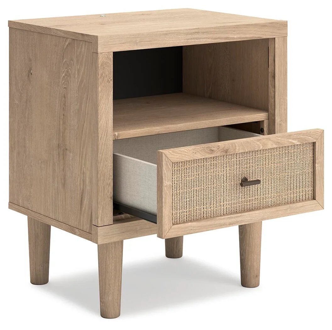 Modern one-drawer nightstand with a light oak finish, cane-inspired drawer front, built-in LED lighting, USB ports, and wireless charging.
