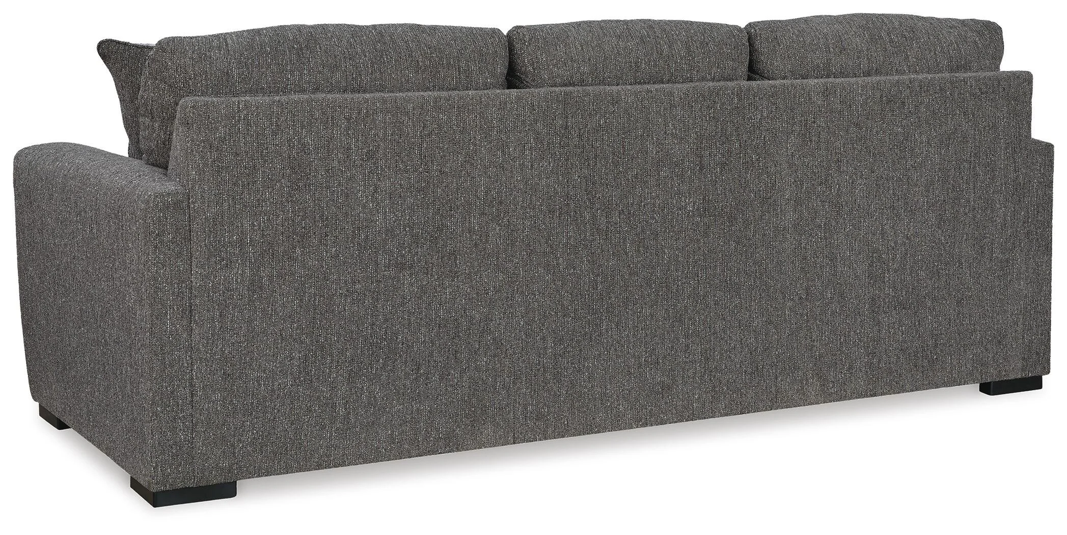 Contemporary reversible sofa chaise with soft polyester upholstery, movable ottoman, plush cushions, and oversized seating.
