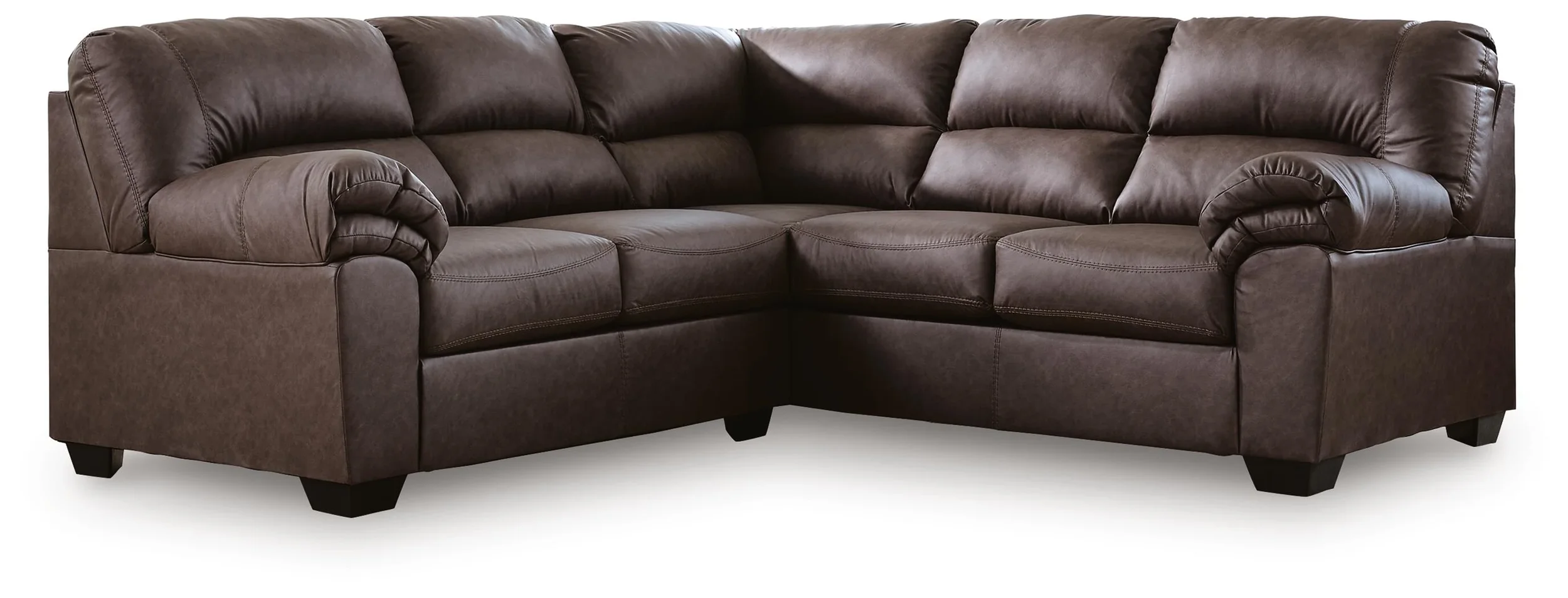 Contemporary faux leather sectional with corner wedge, jumbo stitching, plush seating, and rich umber upholstery.