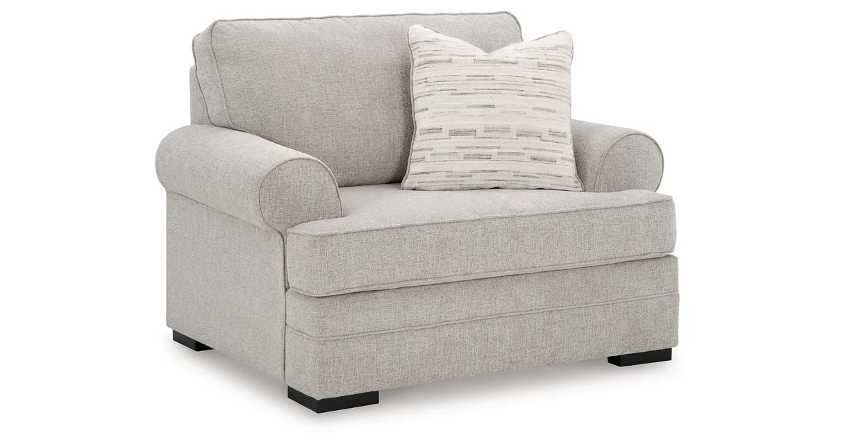 Oversized upholstered chair with textured polyester fabric, reversible seat cushion, plush accent pillow, and supportive foam cushioning.