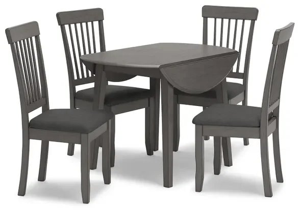 Stonehill 5-piece dining set with a round drop leaf table and four gray upholstered dining chairs on a white background.