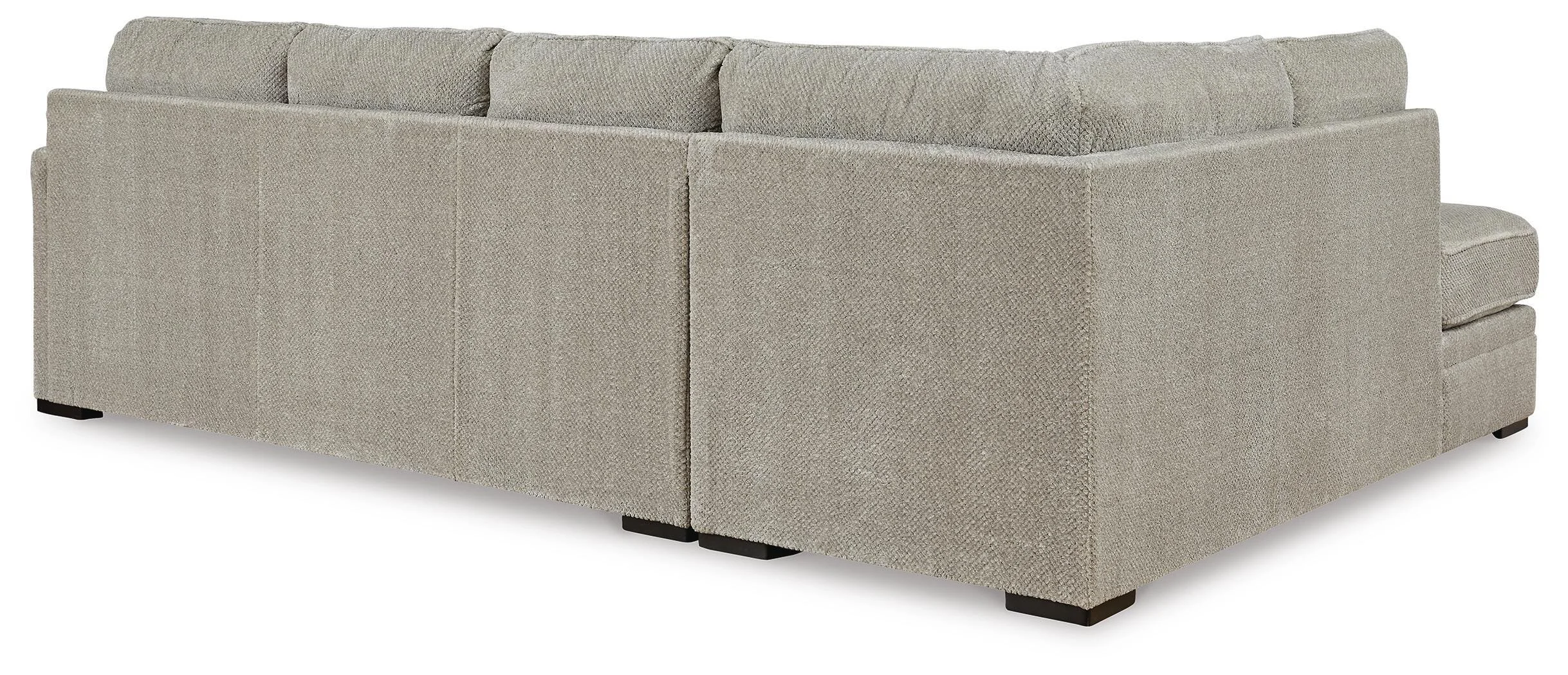 Contemporary dual-chaise sectional with soft polyester upholstery, reversible cushions, plush seating, and coordinating accent pillows.
