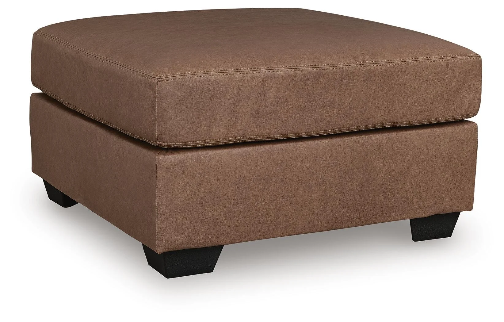 Matching oversized faux leather ottoman with plush cushioning and contemporary styling.