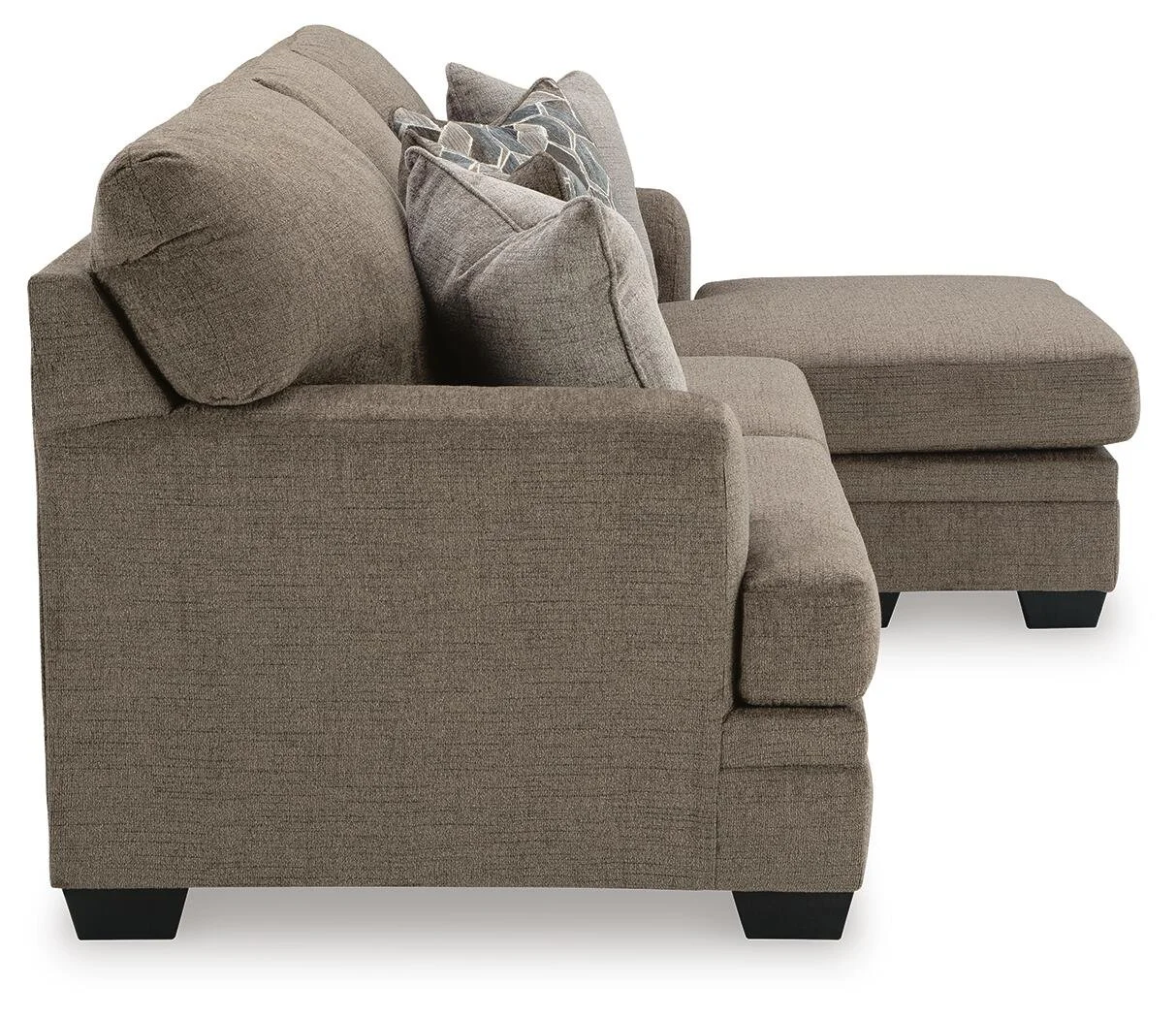 Modern reversible sofa chaise with soft polyester upholstery, movable ottoman, plush cushions, and a contemporary silhouette.