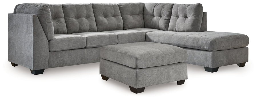 Matching oversized accent ottoman with soft gray polyester upholstery, plush cushioning, and a contemporary design.