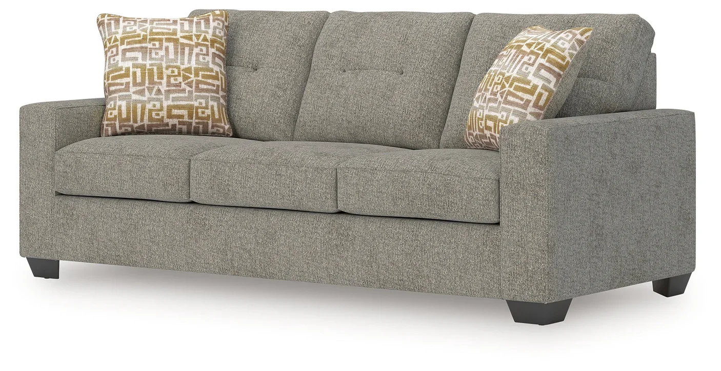 Transitional sofa with track arms, soft neutral polyester upholstery, plush cushions, and coordinating accent pillows.