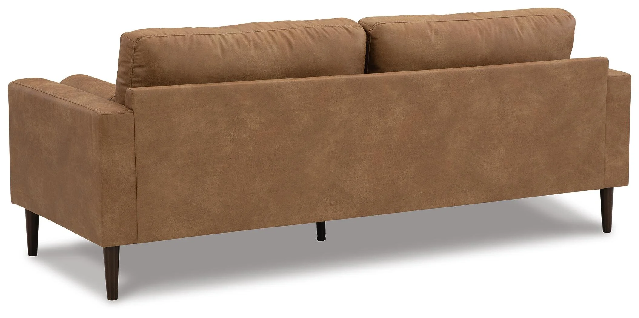 Modern sofa with warm caramel faux leather upholstery, plush loose cushions, bolster pillows, and faux wood accent legs.
