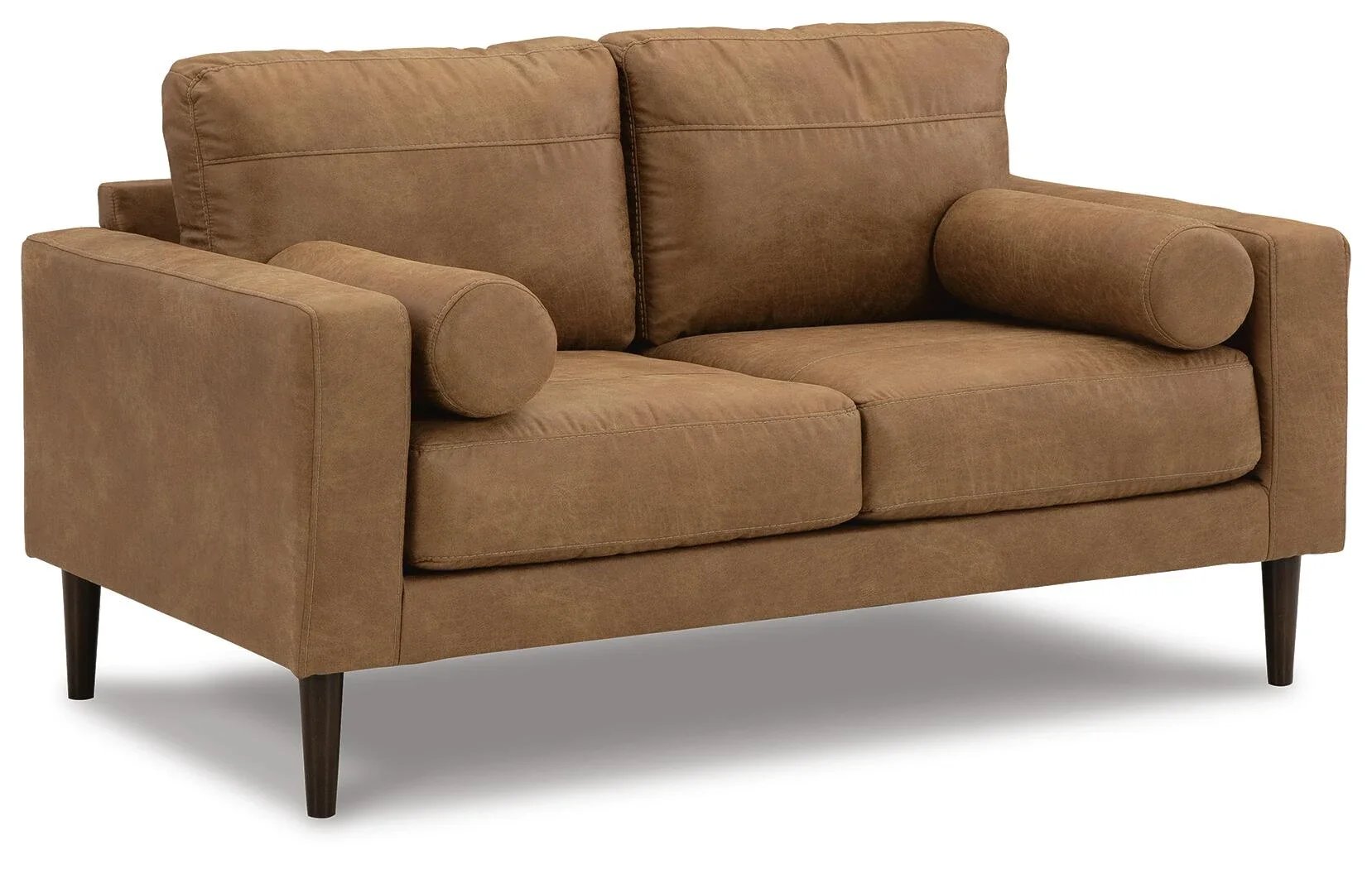 Matching loveseat with caramel faux leather upholstery, loose cushions, bolster pillows, and contemporary styling.