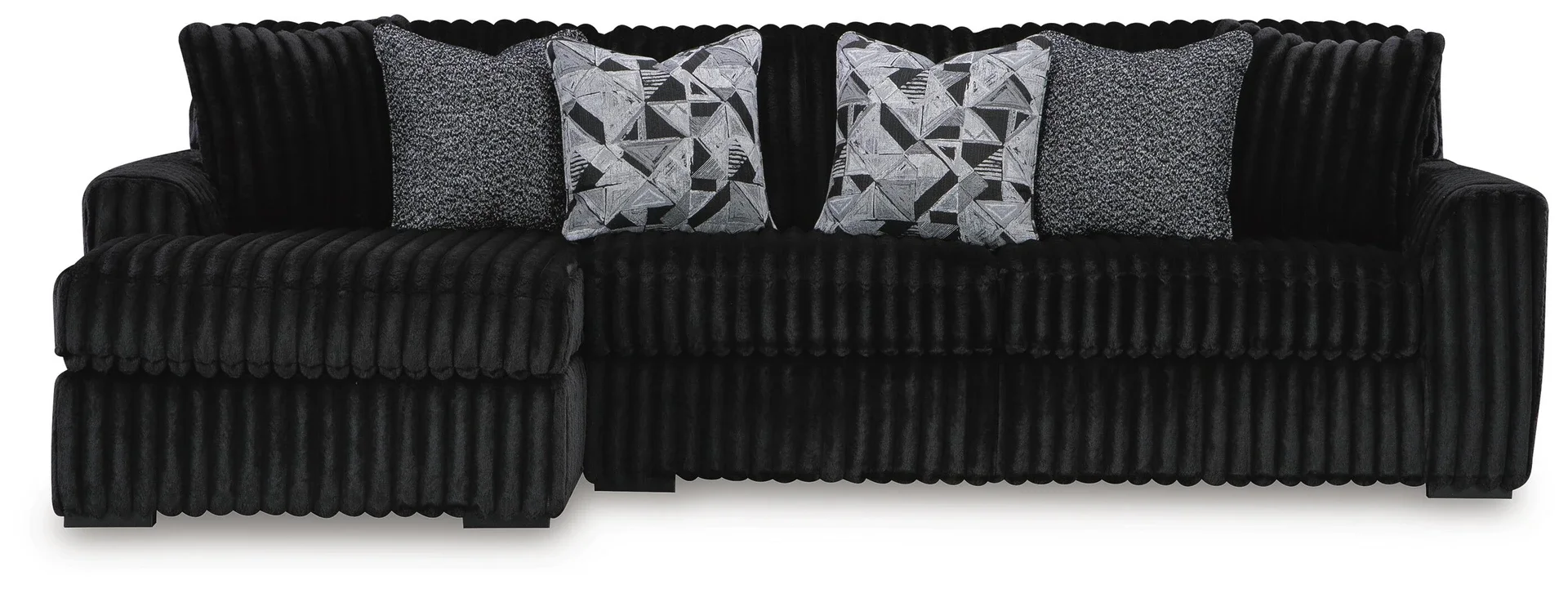 Oversized contemporary sectional with chaise featuring jumbo corduroy upholstery, reversible seat cushions, and plush seating.