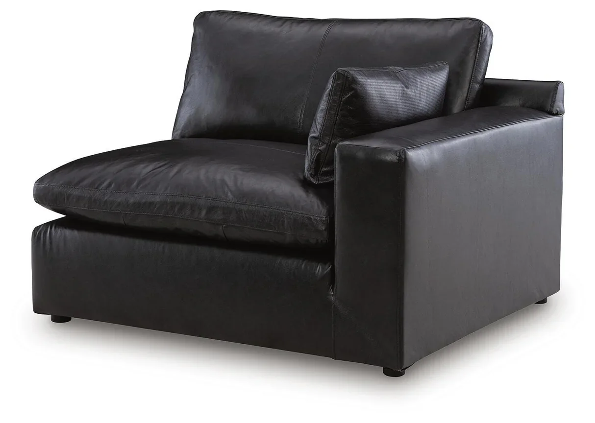 Modern modular leather sofa with top-grain leather seating, feather-fiber cushions, bolster pillows, and flexible three-piece configuration.