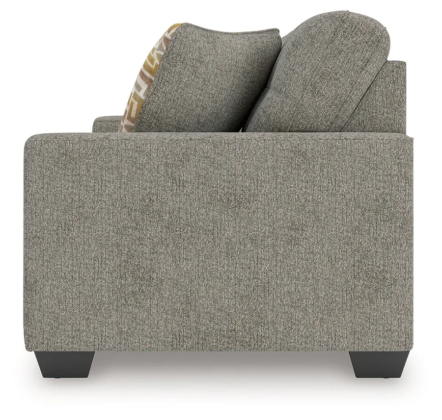 Transitional sofa with track arms, soft neutral polyester upholstery, plush cushions, and coordinating accent pillows.