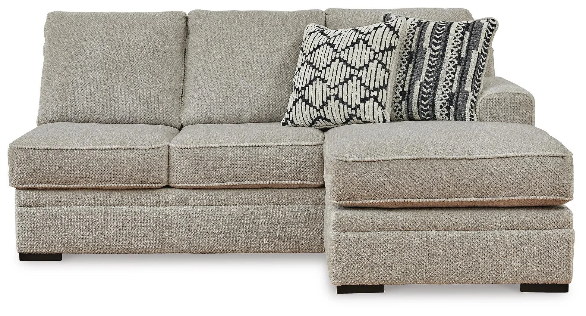 Contemporary dual-chaise sectional with soft polyester upholstery, reversible cushions, plush seating, and coordinating accent pillows.