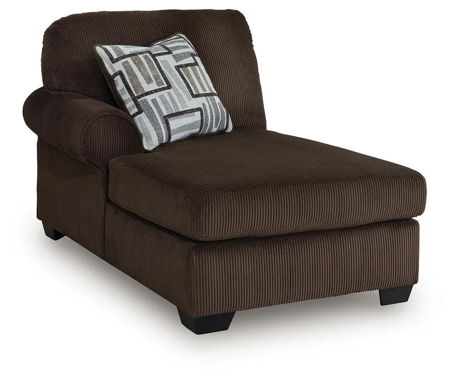 Close-up of the Kingston sectional showcasing the soft corded polyester upholstery, plush cushions, accent pillows, and quality craftsmanship.