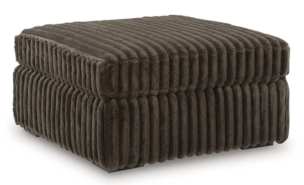 Matching oversized upholstered ottoman with jumbo corduroy fabric, plush cushioning, and contemporary styling.