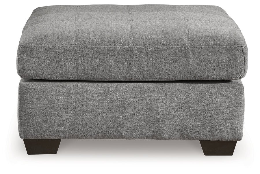 Matching oversized accent ottoman with soft gray polyester upholstery, plush cushioning, and a contemporary design.